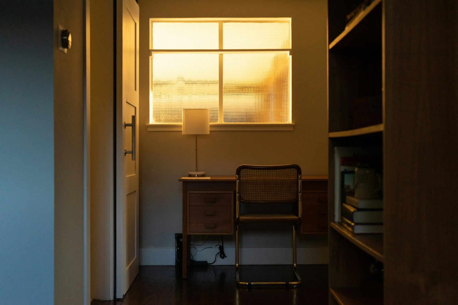 White table lamp on a wood surface
